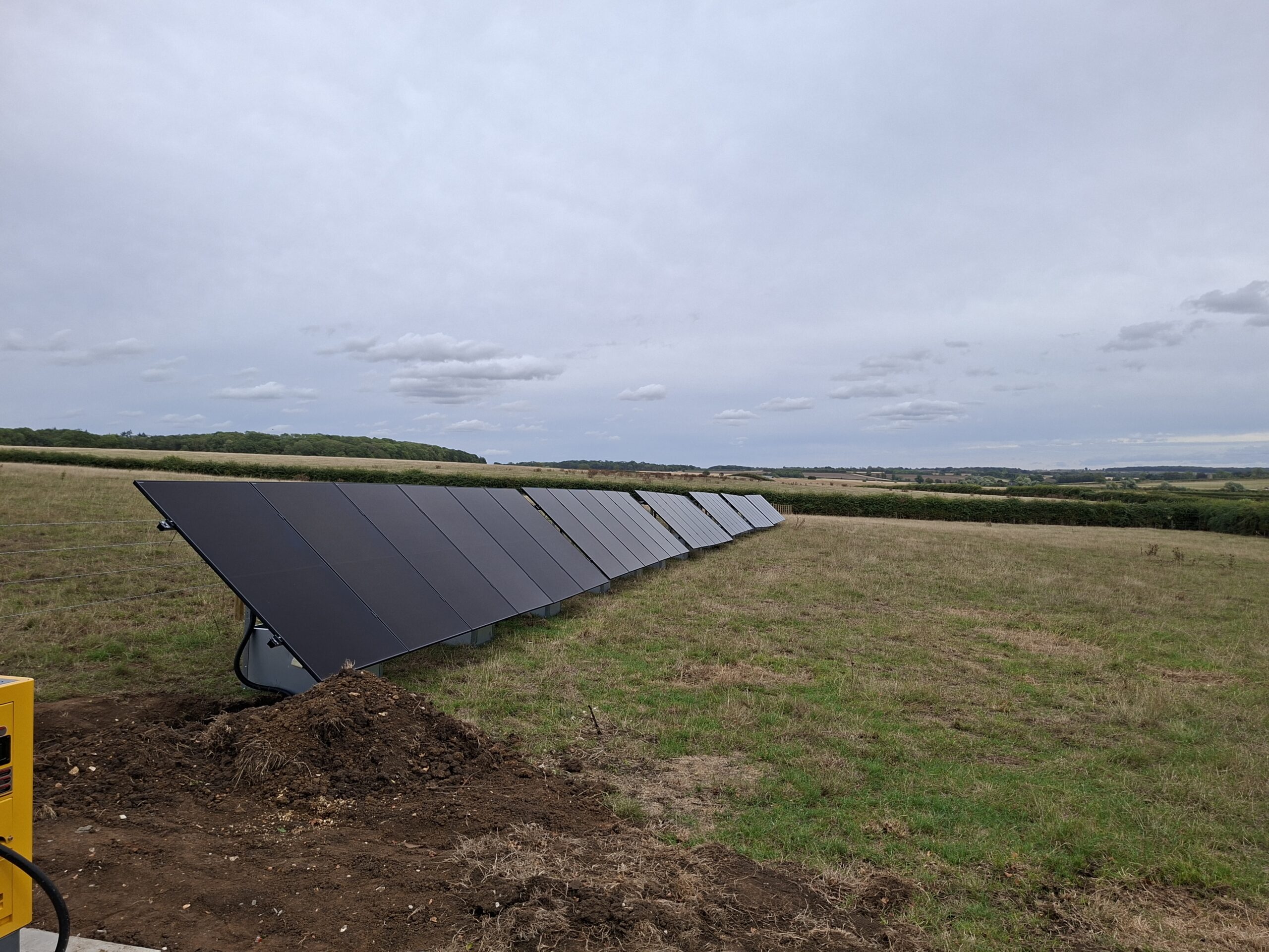 Ground mounted solar array in a field
